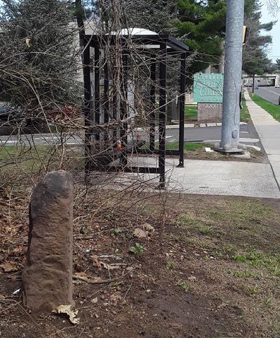 Milestone in front of the Spring Glen Medical Center at 2200 Whitney Ave.